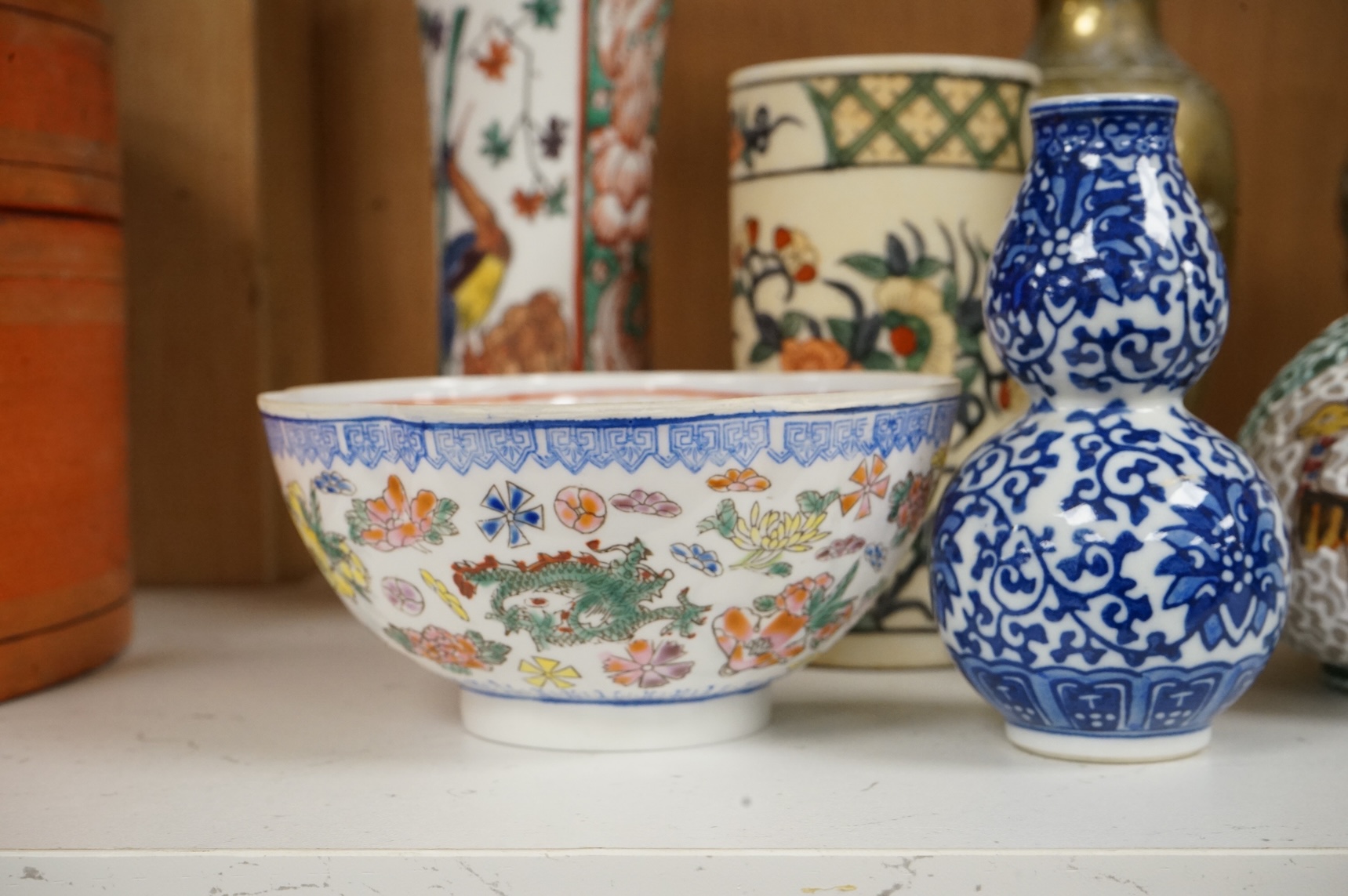 Chinese and Japanese items to include an early 20th century Chinese eggshell porcelain bowl and an enamelled bronze vase, largest 19cm high
